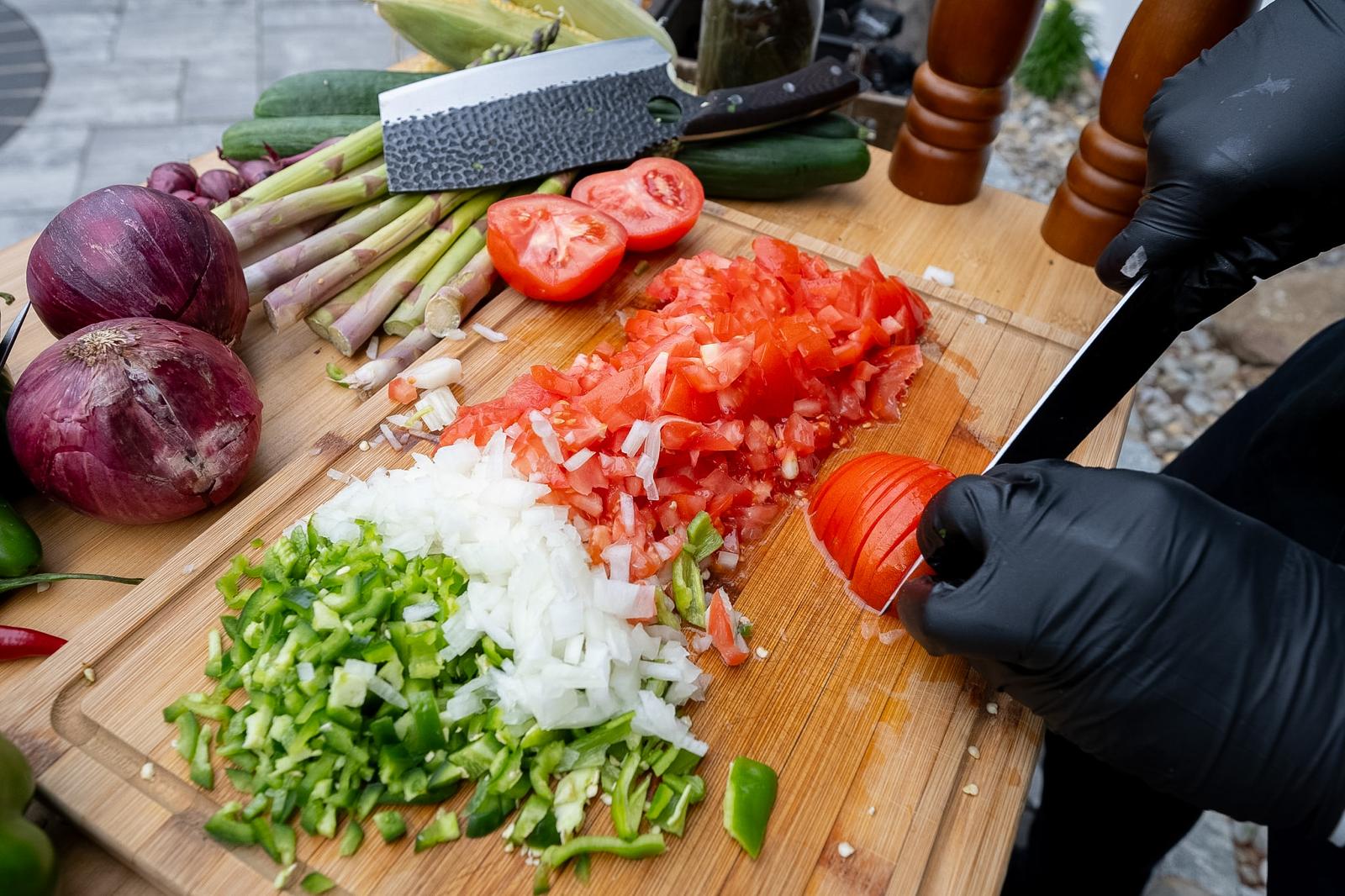 Fresh vegetables being prepared by hand
